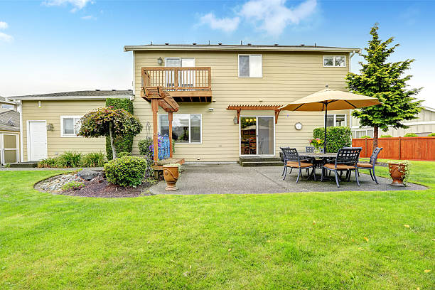 istock Patio area with table set and umbrella 515196413