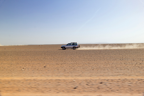 Dubai, United Arab Emirates - 24 November 2021: Desert safari with Dune bashing by a 4x4 car is a very popular activity.