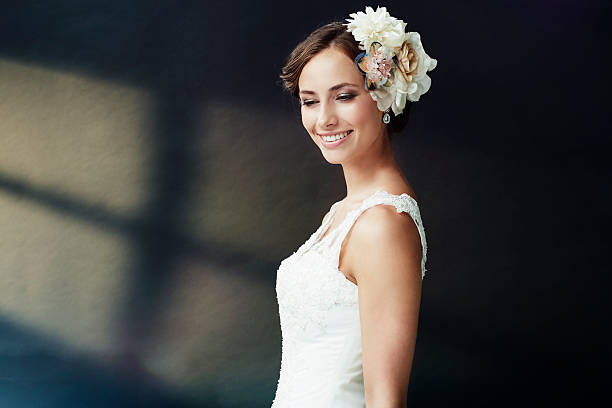 istock Elegant young bride in wedding dress, studio shot 515196735