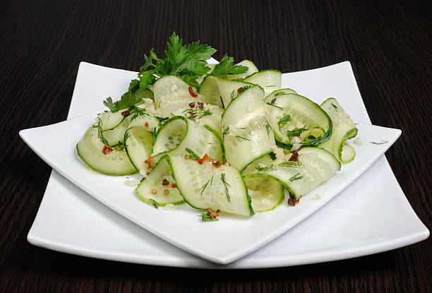 istock Salad from fresh cucumbers with garlic, dill, spices 515196797