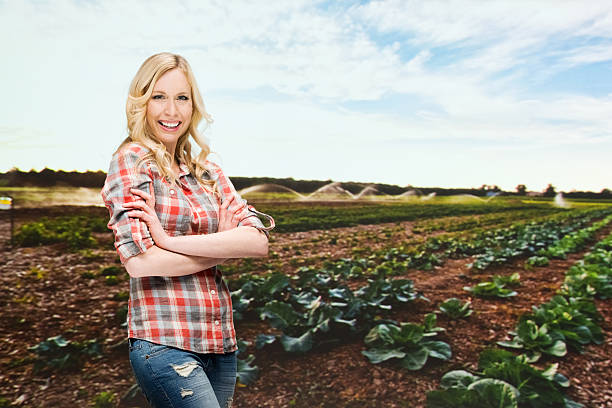 istock Cheerful farmer standing at the vegetable garden 515198719