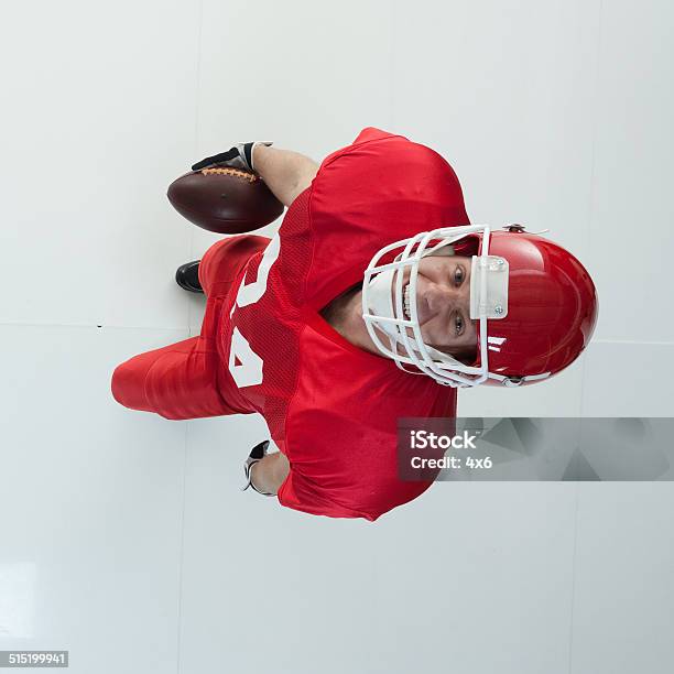 American Football Player Looking At Camera Stock Photo - Download Image Now - 20-29 Years, Adult, Adults Only