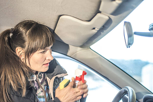 istock Young Caucasian Woman Cleaning Car 515200696