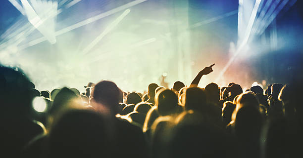 istock People at concert party. 515201096