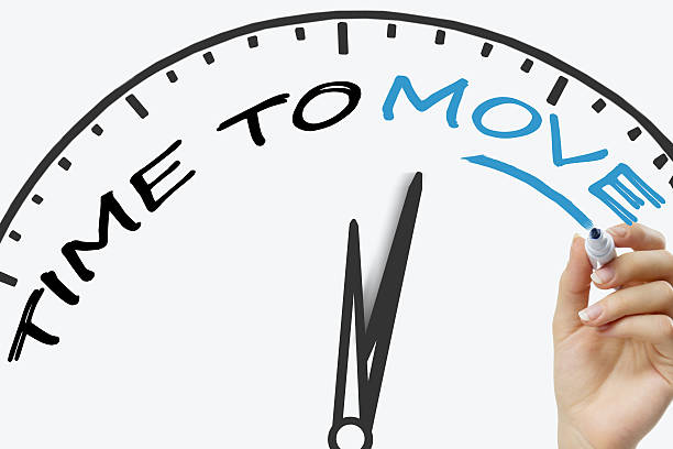 istock Hand writing Time to move concept with blue marker on 515201308