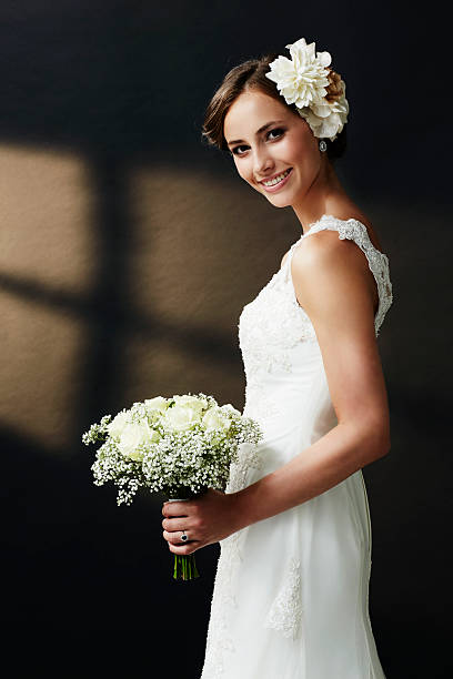 istock Stunning young bride holding bouquet, portrait 515201581