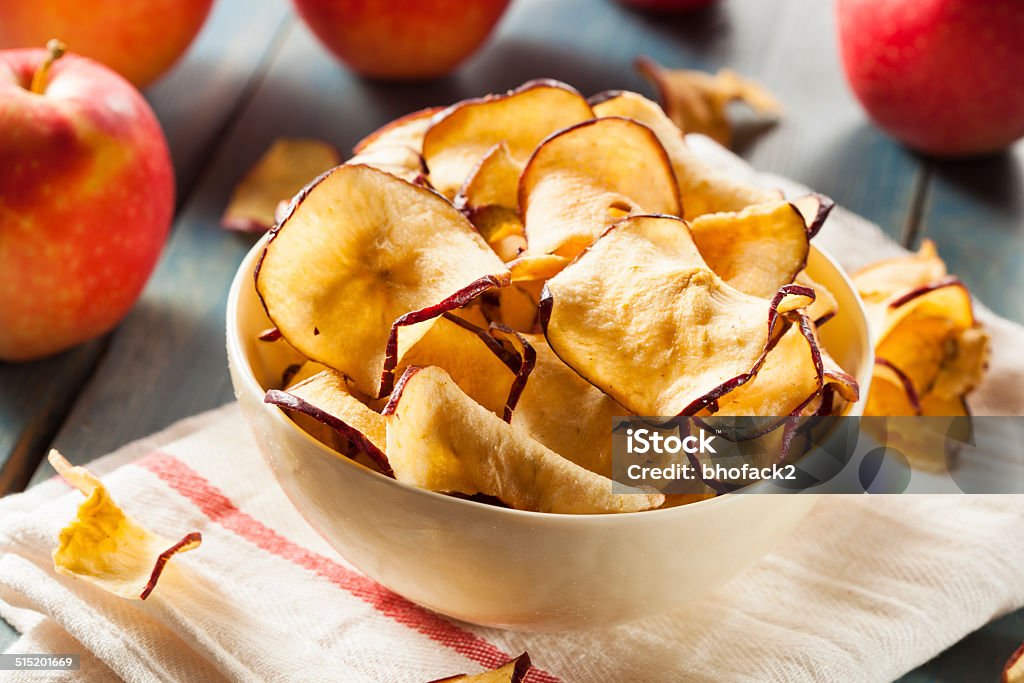 Baked Dehydrated Apples Chips Baked Dehydrated Apples Chips in a Bowl Apple Chips Stock Photo