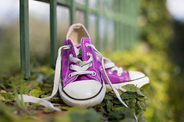 little child sneakers shoes stock photo