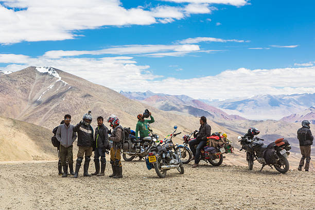 Second highest pass in the world Tanglang La, India - July 22 2014: A group of bikers takes a break on the summit of the Tanglang La pass over 5300m  high in Ladakh in India leh district stock pictures, royalty-free photos & images