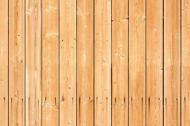 istock Seamless background texture of new wooden lining boards wall 515219195