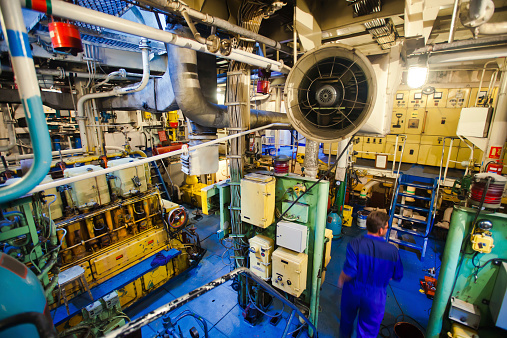 Engine room on a cargo boat ship
