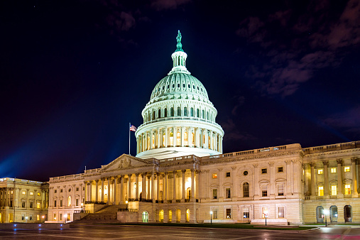 The United States Capitol in Washington DC at night