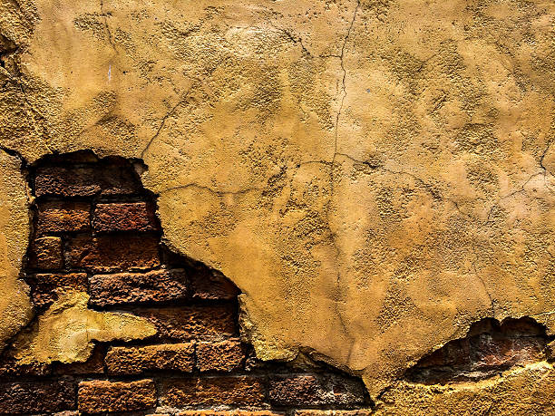 istock Cracked Old Vintage Brown Concrete Wall with Brick 515223100