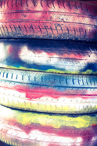 istock Tires are painted with colored paints for background 515231416