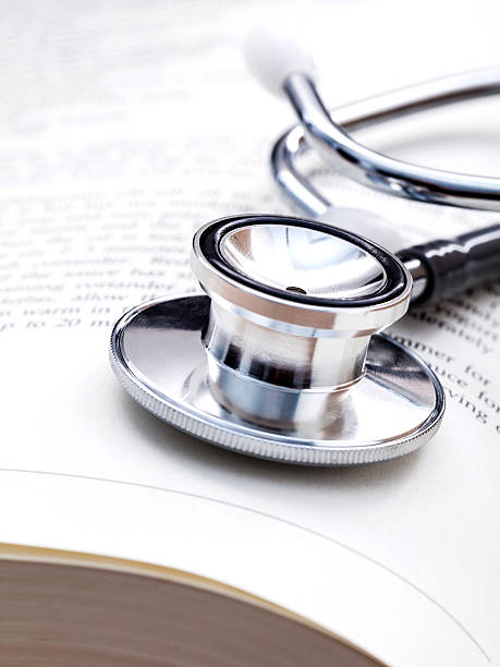 istock Stethoscope on a textbooks with shallow depth of field. 515231480
