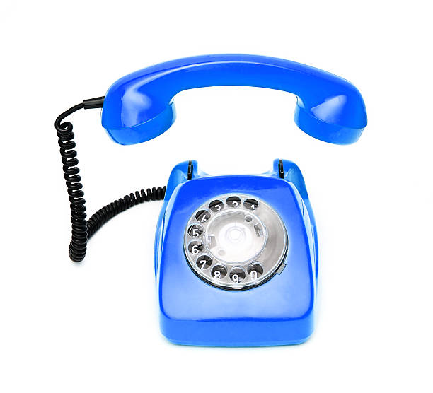 istock Blue retro telephone isolated on white background. 515234158