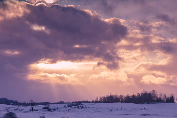 istock Winter sunset over snowy field 515234524