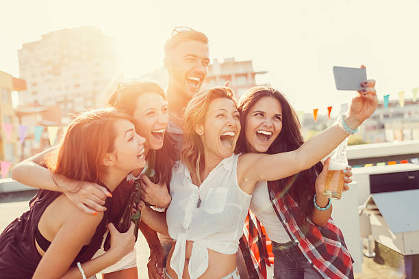 istock Friends taking selfie on the rooftop 515235638