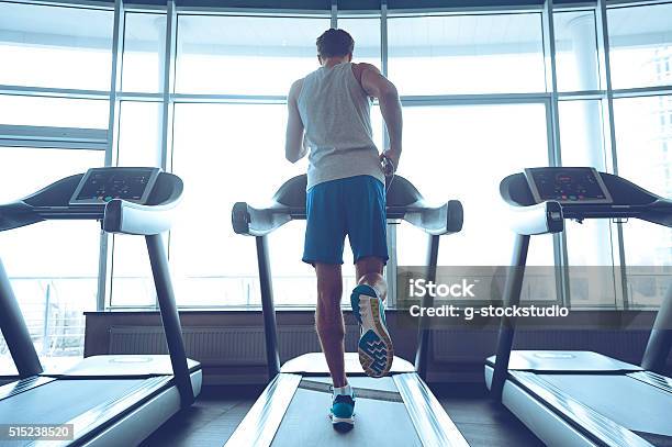 Jogging His Way To Good Health Stock Photo - Download Image Now - Treadmill, Men, Only Men