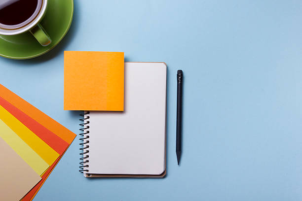istock Office desk table with supplies top view. Notepad, pen and 515238956