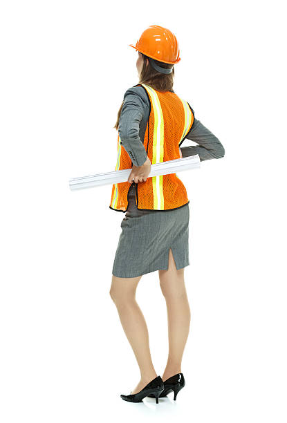 istock Rear view of architecture holding blueprint 515243655