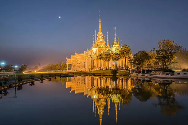 Photo of Beautiful temple with reflection in Thailand