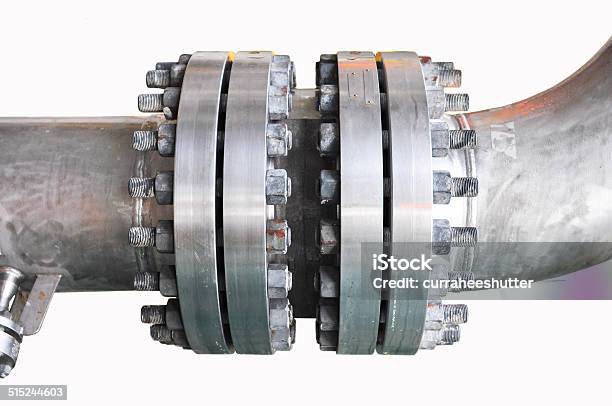 Metal Pipe Flanges With Bolts On An Isolated Background Stock Photo - Download Image Now