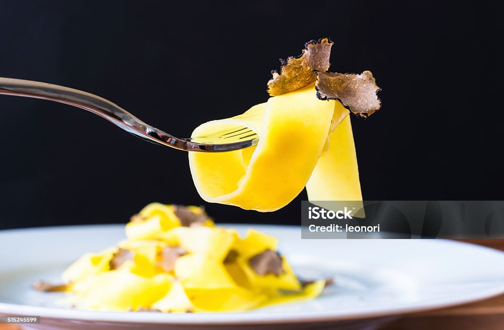 Pasta with truffles. Pasta tagliatelli with truffles, gourmet restaurant plate. Truffle - Fungus Stock Photo