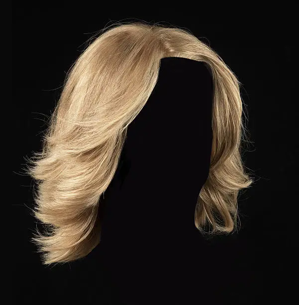 female blonde wig on a black background