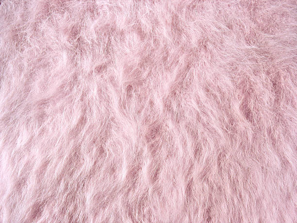 istock Texture of soft pink fleecy fabric (angora woolen cloth) 515246239