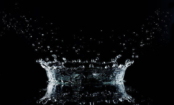istock Water splash on black background. Hi-Res 1/8000 sec. Broncolor Scoro 515246765