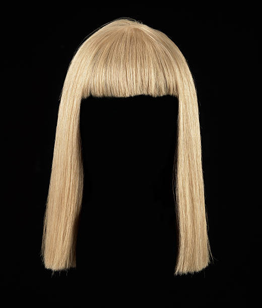 blonde wig female blonde wig on a black background blonde hair stock pictures, royalty-free photos & images