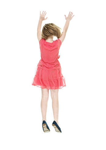 Rear view of little girl jumpinghttp://www.twodozendesign.info/i/1.png