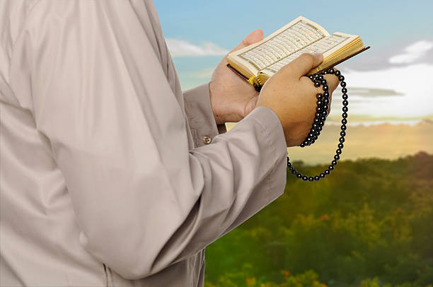istock Young Man Reading The Holy Koran 515261371