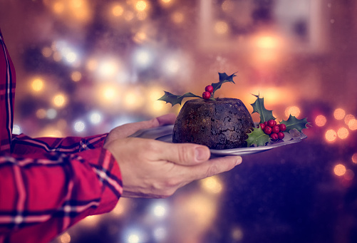 Traditional British Christmas Pudding served on a plate