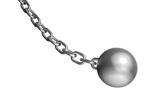 Demolish ball hanging on the iron chain. Isolated on the white background without shadow.