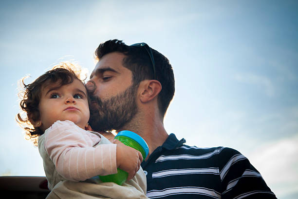 istock Father kissing his daughter 515264542