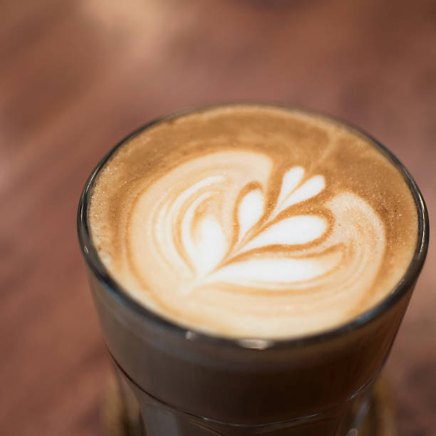 istock Cup of coffee on wood table 515265730