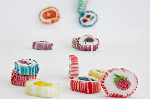 istock some colorful candies on white background 515267640