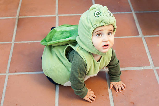 istock Babyboy in a turtle costume 515267676