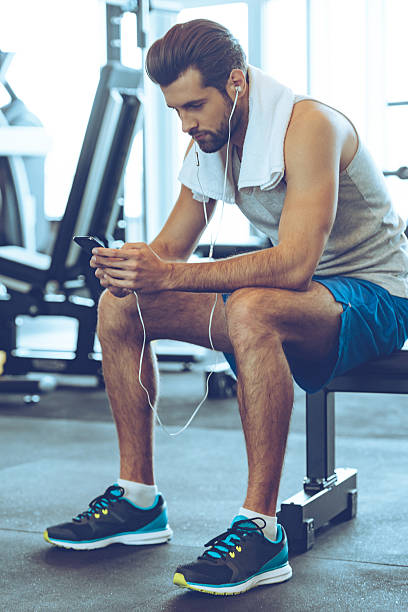 istock Creating new playlist for his new work out. 515268876
