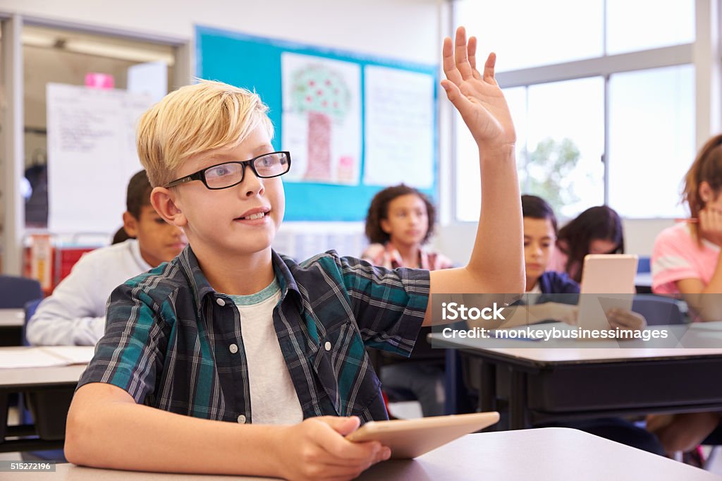 Student Glass Rise Hand Boy With Glasses Raising Hand In Elementary School Class Stock Photo ...