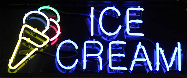Ice Cream Sign A colorful neon sign reading Ice Cream neon sign ice cream stock pictures, royalty-free photos & images