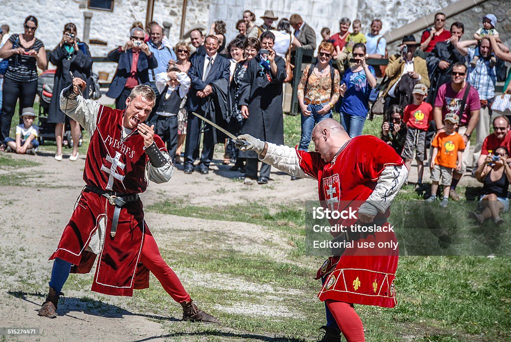 Medieval Fighters Visegrad, Hungary - April 28, 2012: Men battle each other at a Medival renaissance faire in Hungary. Activity Stock Photo