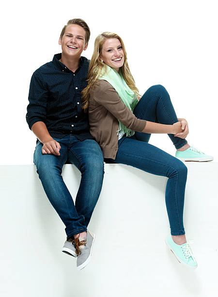 istock Cheerful couple on box & looking at camera 515274763