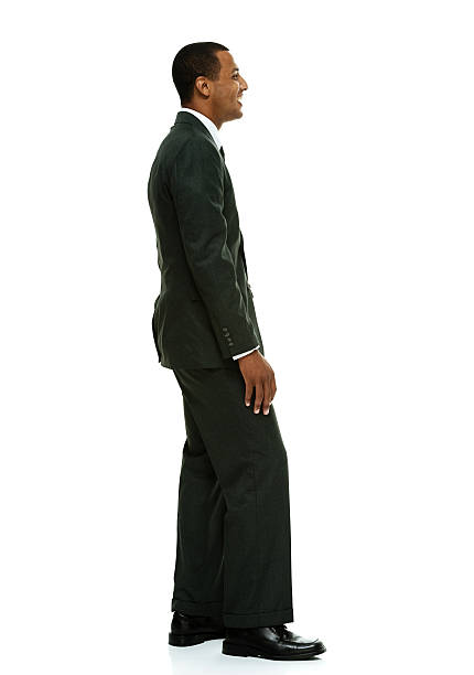 istock Smiling businessman looking away 515275031