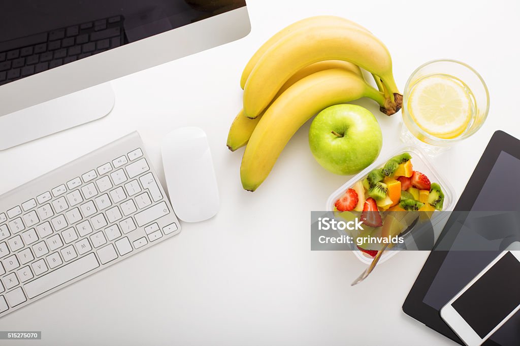 Working space in office and modern technology Fruit Stock Photo