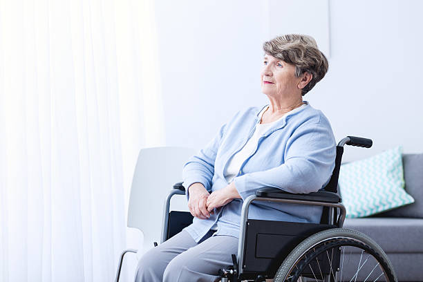 istock Disabled old woman on wheelchair 515275494