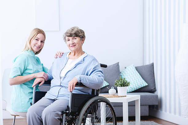 istock Elderly woman and caregiver 515275560