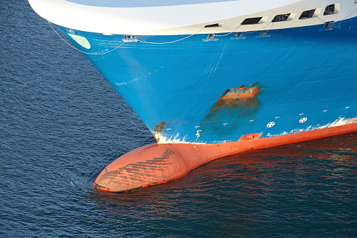 A bulbous bow of a vessel at the Kiel Canal taken from a bridge.